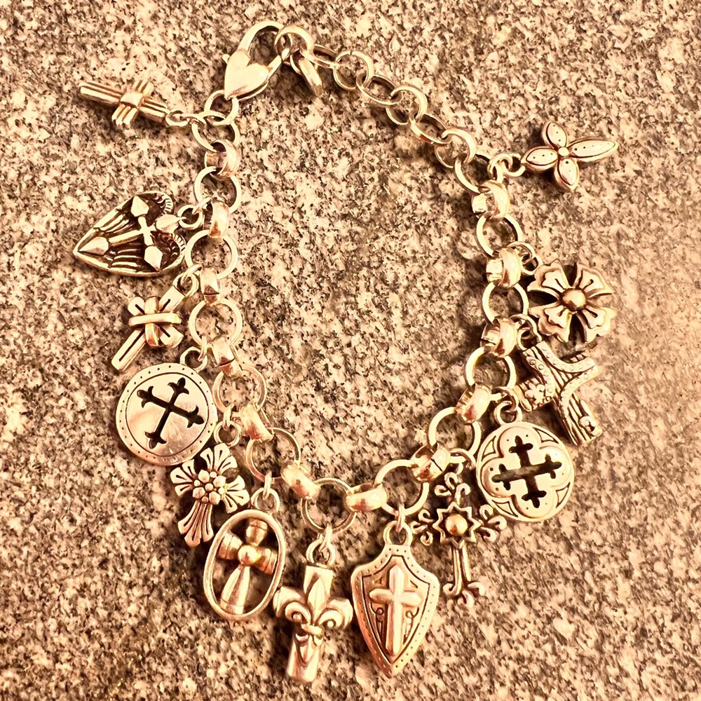 Silver Charm Bracelet with Intricate Designs